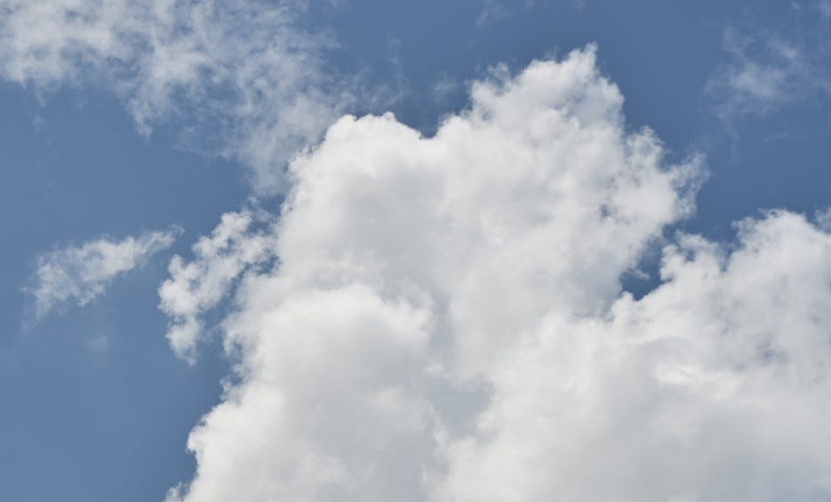 Photo of white, fluffy clouds by Brittany Howard
