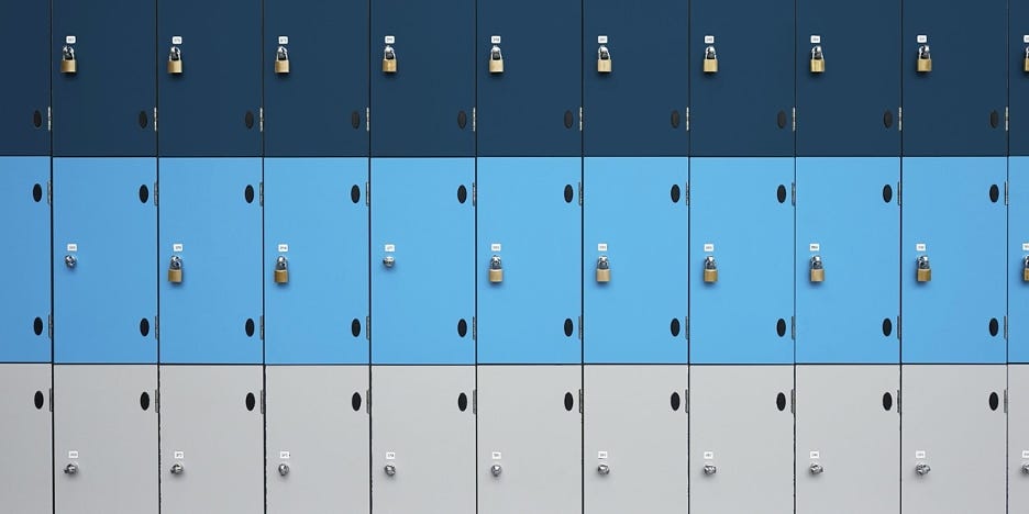 rows of navy, turquoise, and grey lockers