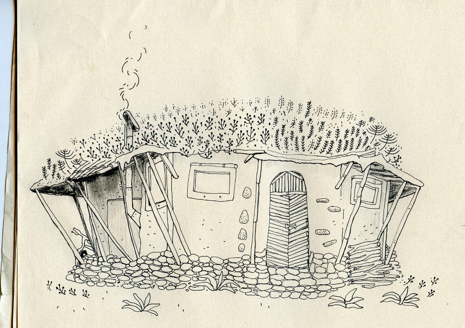 A small black and white one story home, built from pebbles and concrete, with fireplace and a roof of small flowers