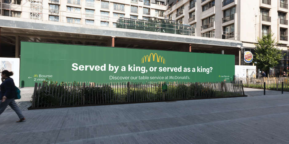 McDonald’s billboard mocking Buger King in Belgium — Brand rivalry and marketing competition, advertising war.