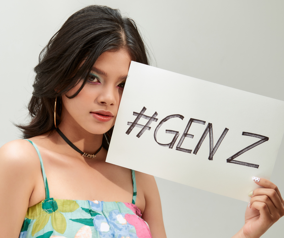 A young woman holding a Gen Z sign