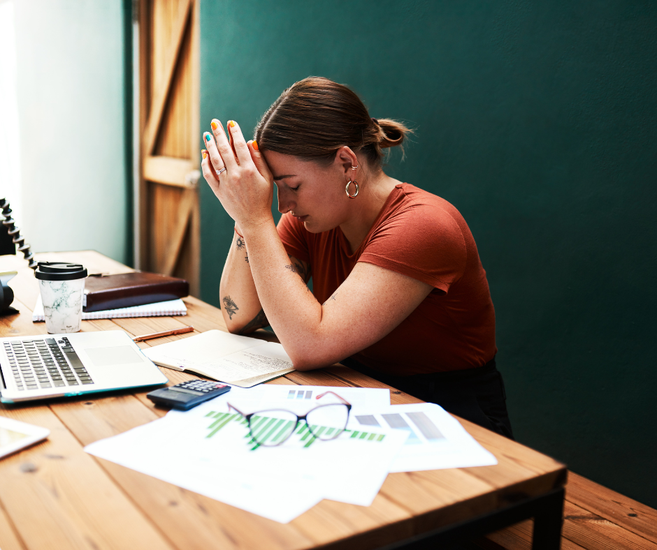 woman overwhelmed by workload