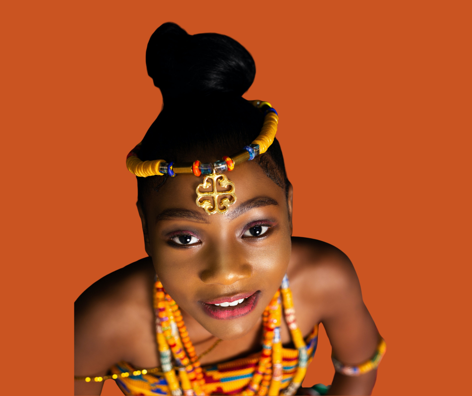 Young pretty woman in traditional orange African attire. Photo credit: canva.