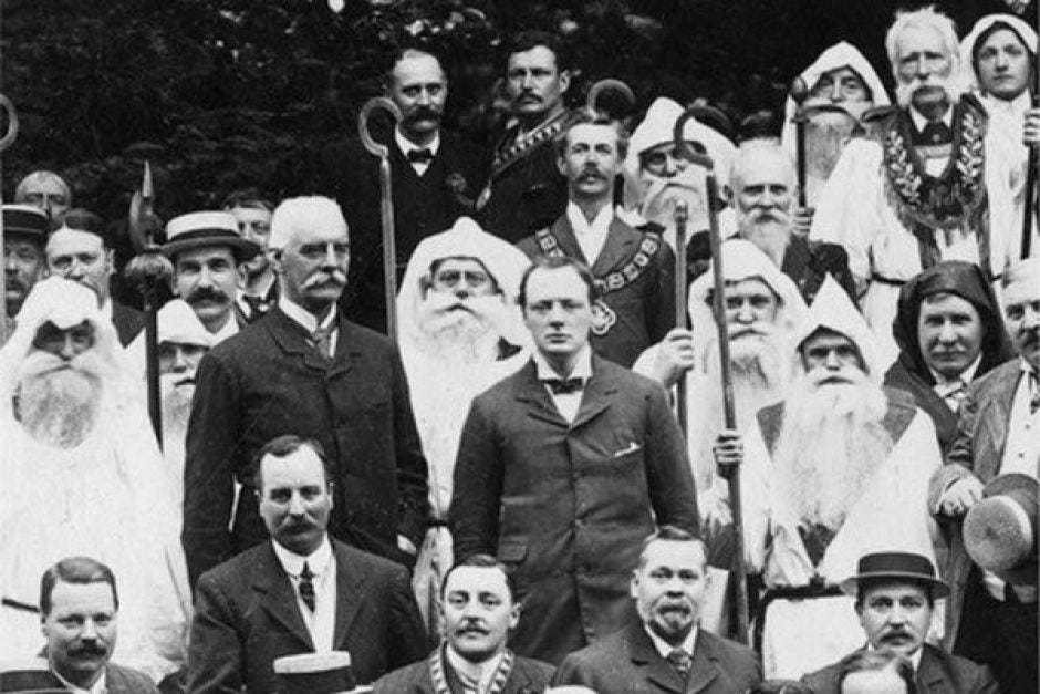 A young Sir Winston Churchill at his initiation into the Mystic Circle of Bards (Center)