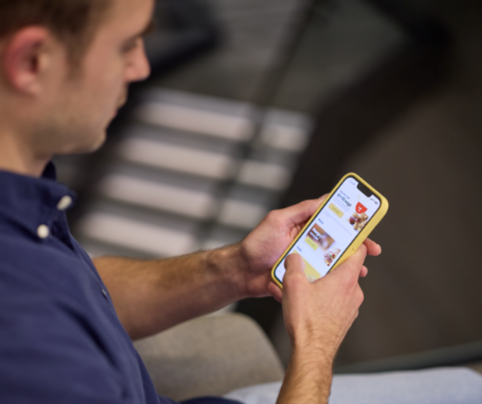 Man using the McDonald’s mobile app.