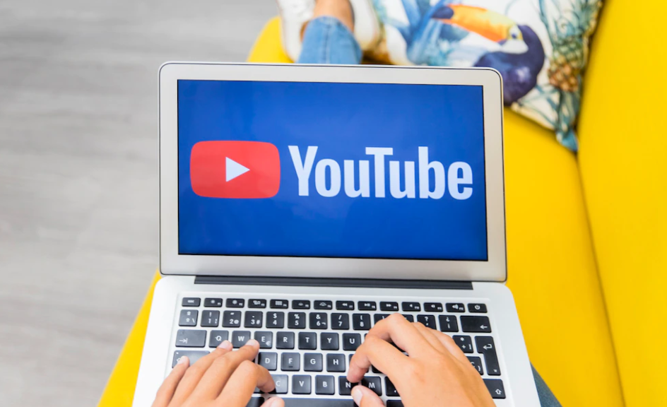 A laptop with a YouTube logo. #sidehustles #additionalincome #earnmoney #finance
