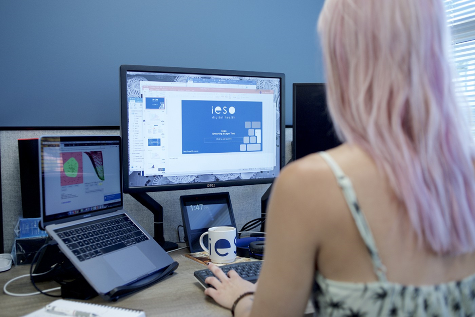 Ieso — woman in front of a computer