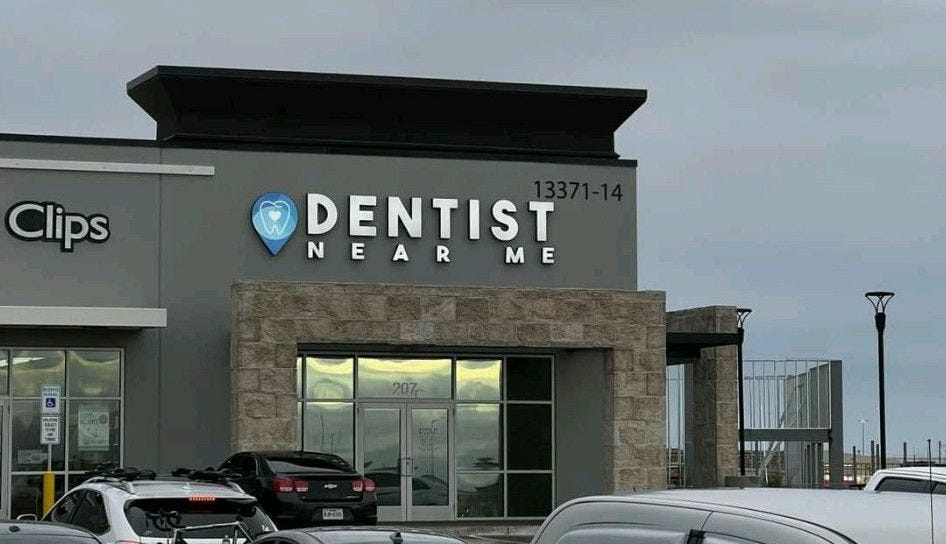 A dentist office with the logo, “DENTIST NEAR ME”