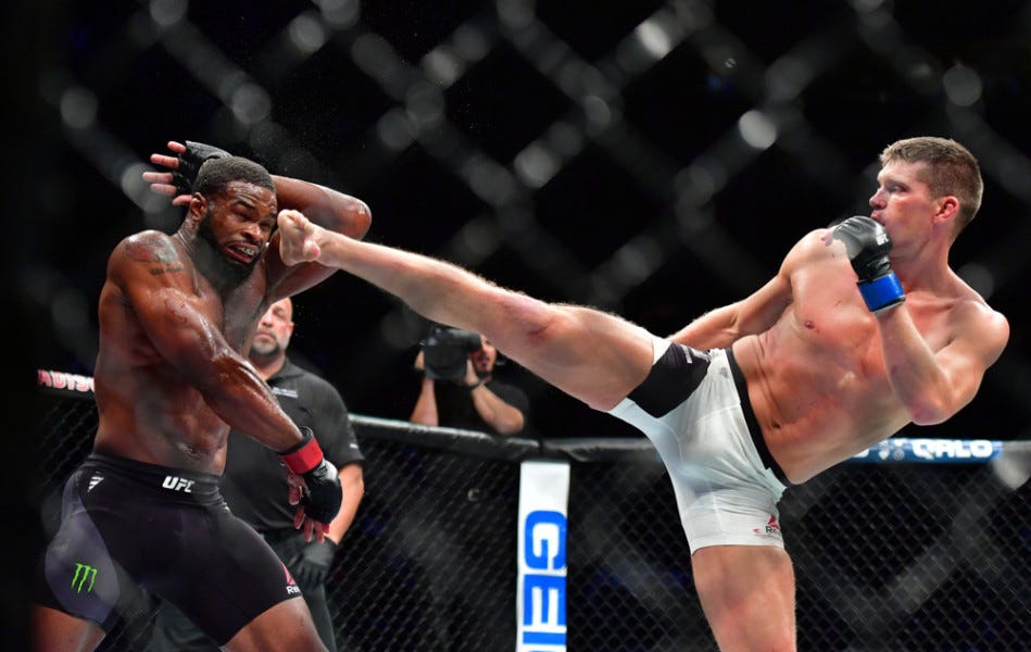 Stephen Thompson (right) using his karate style during his welterweight championship fight against Tyron Woodley.