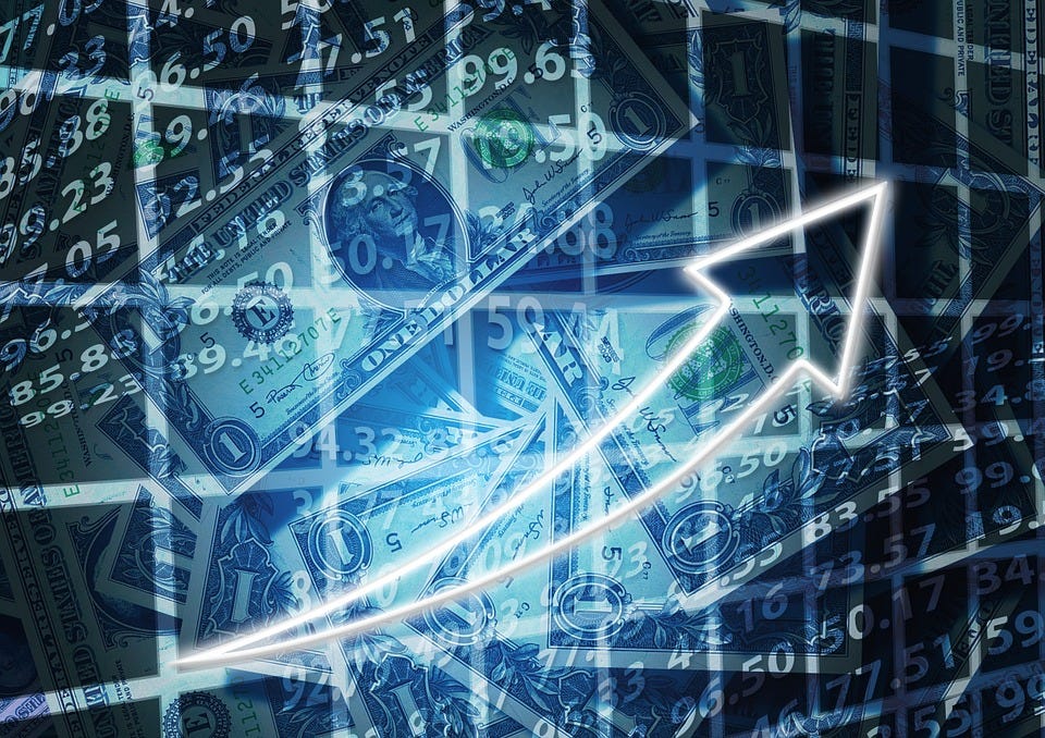 A white arrow pointing upwards indicates a booming economy. Background in dark colors with various numbers and dollar bills.