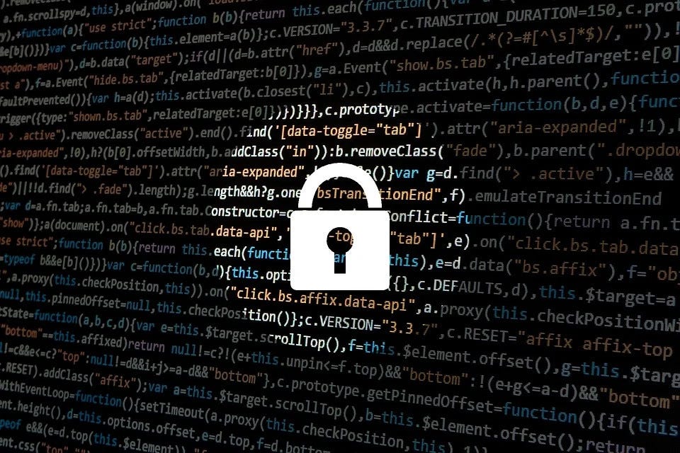 Padlock over a background of code