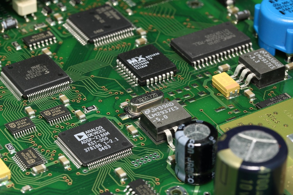 A picture of a printed circuit board populated with different componets