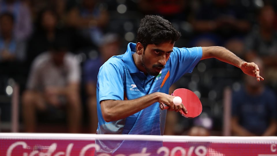 G Sathiyan playing tennis match