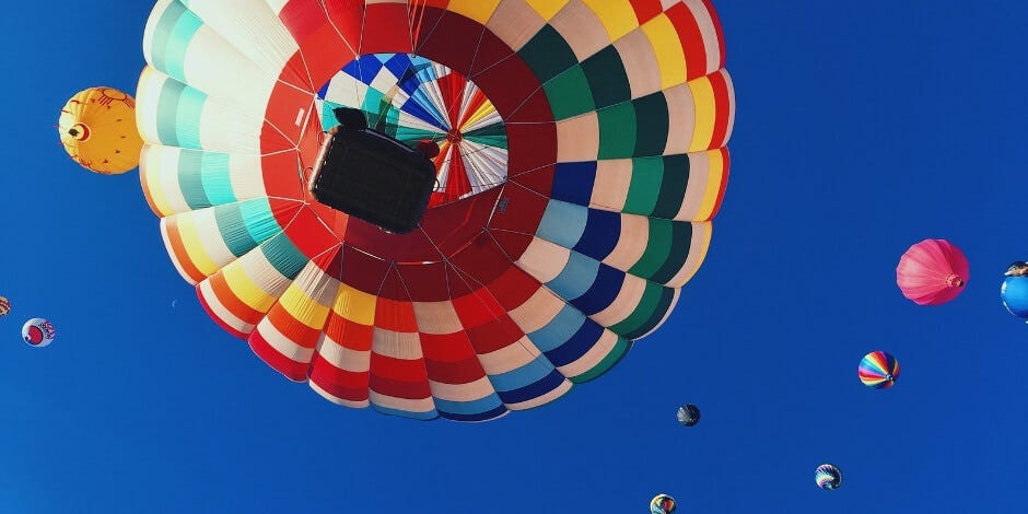 multi-colored hot air balloons in the sky