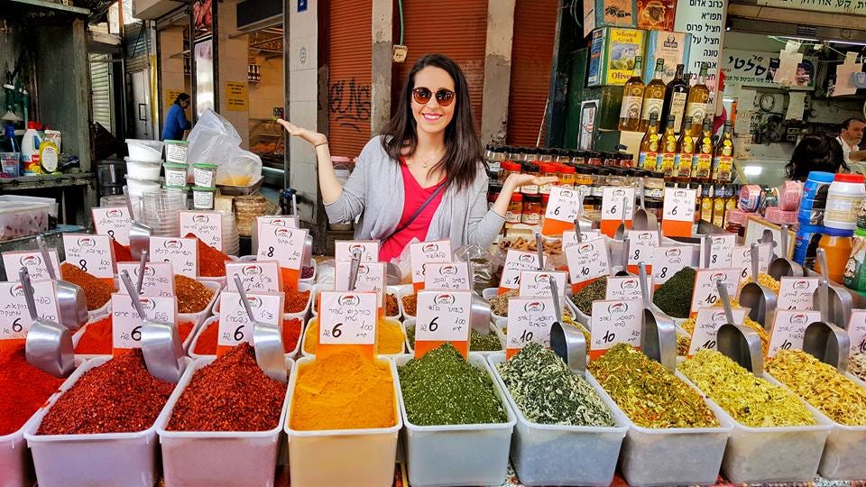 Beth Santos in a spice market in Tel Aviv, Israel