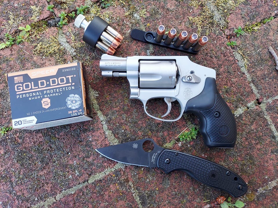 Smith and Wesson 642 Airweight with knife and bullets