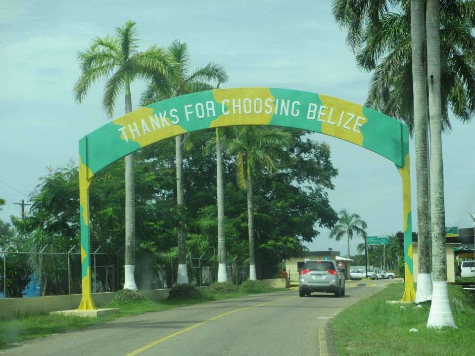 Sign above the entrance to the airport that says “Thanks for choosing Belize.”