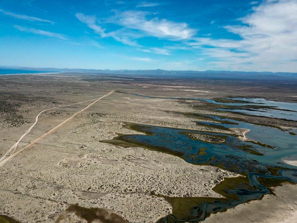 Water merging with the desert as far as the eye can see