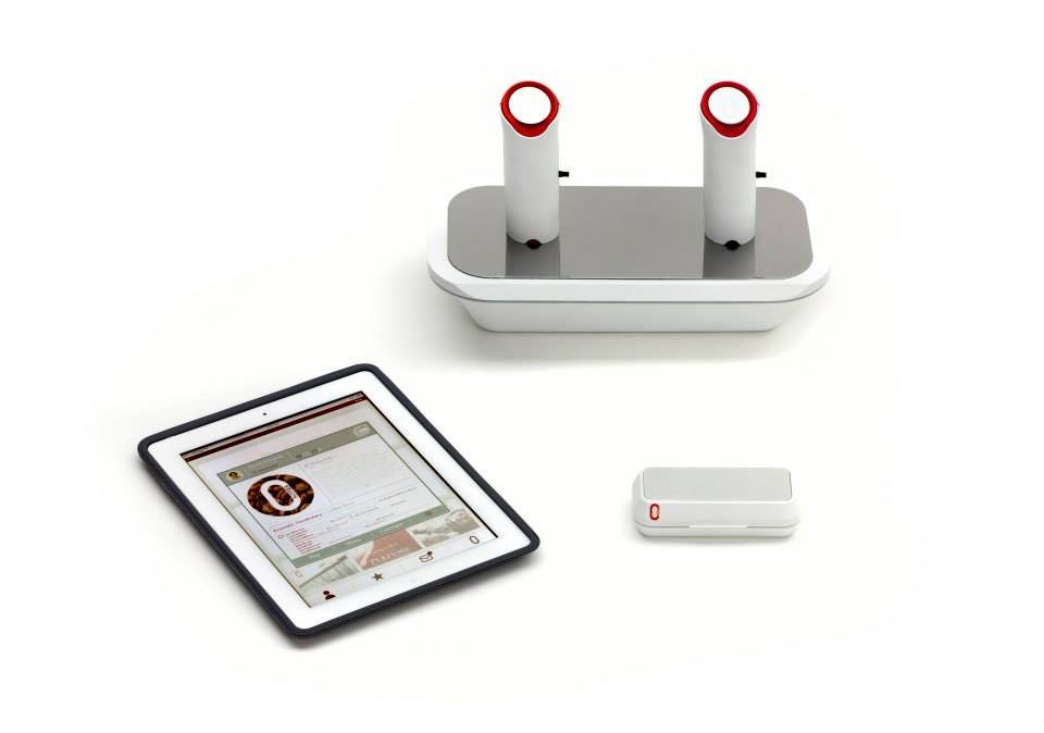 The oPhone and its oChip carrying case, along with the iOS app displayed on an iPad