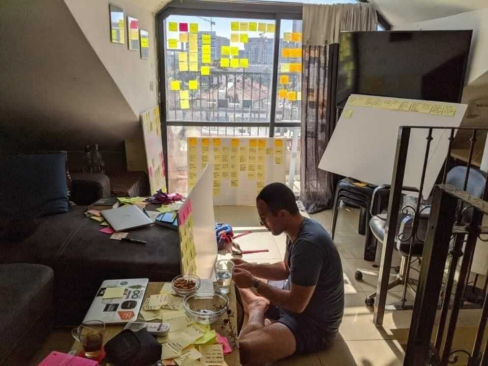 Groove co-founder Josh Greene with post-its, doing research for Groove