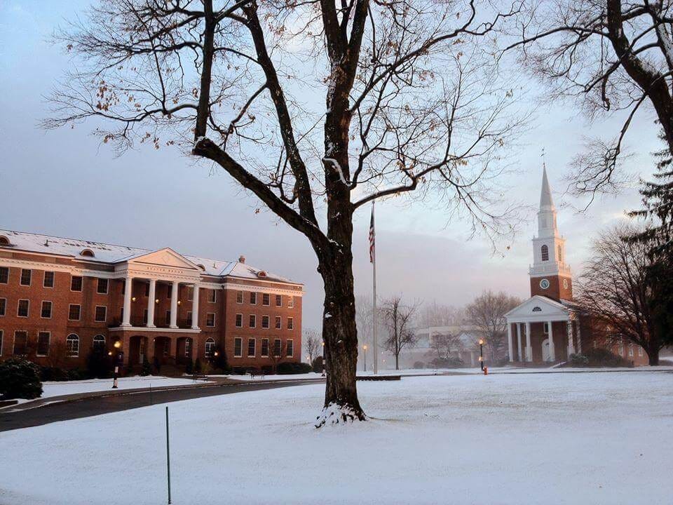 A snowy exterior shot of the campus of the The Ethel Walker School, in wintertime.