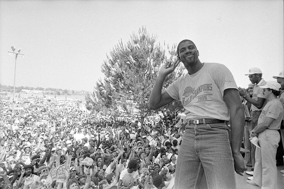 Magic Johnson at the Los Angeles Lakers’ 1985 NBA championship rally in Inglewood, Calif.