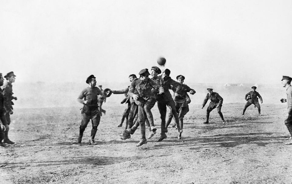 Troops playing football, First World War