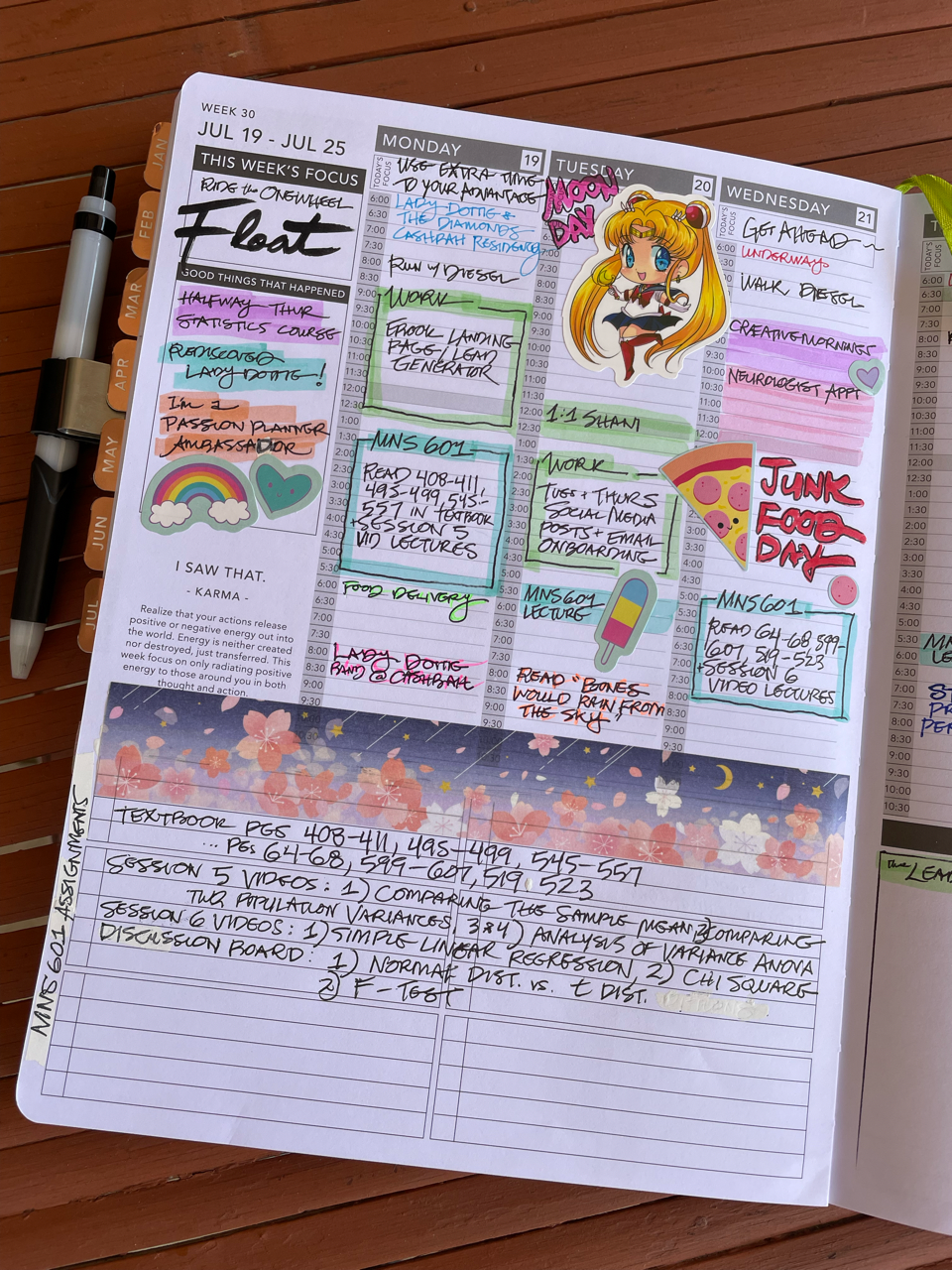 An overhead shot of a weekly agenda covered with writing, colored markings and stickers.