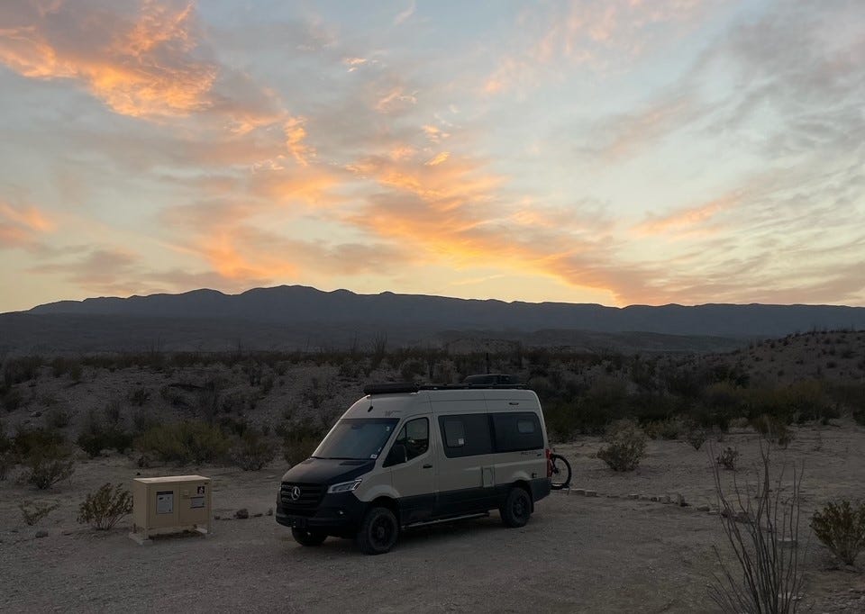 A camper van at the Solis primitive campsite at sunset
