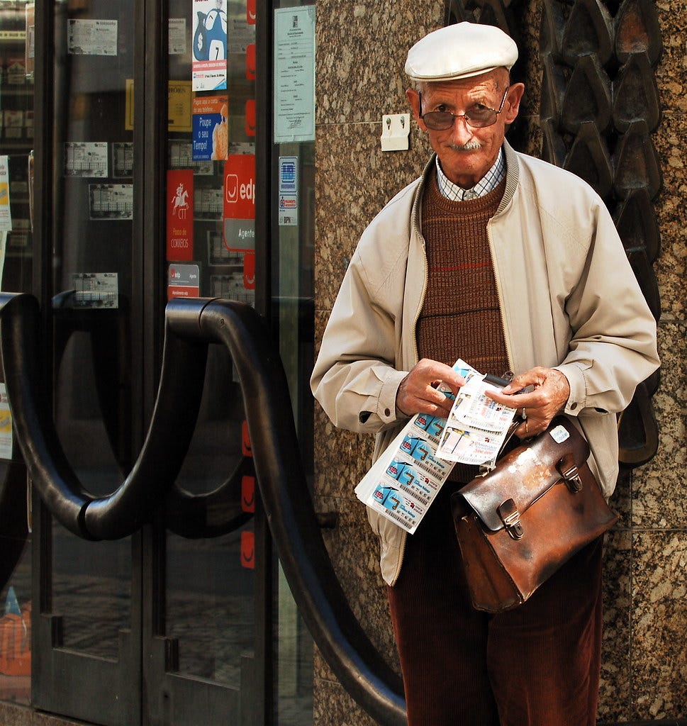 “The lottery ticket seller” by pedrosimoes7 is licensed under (CC BY 2.0)