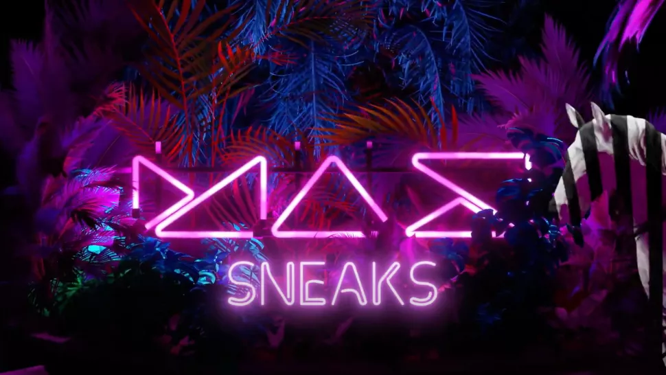 Adobe MAX sneaks graphic in pink neon lights coming out of red, purple, and blue jungle-theme leaves