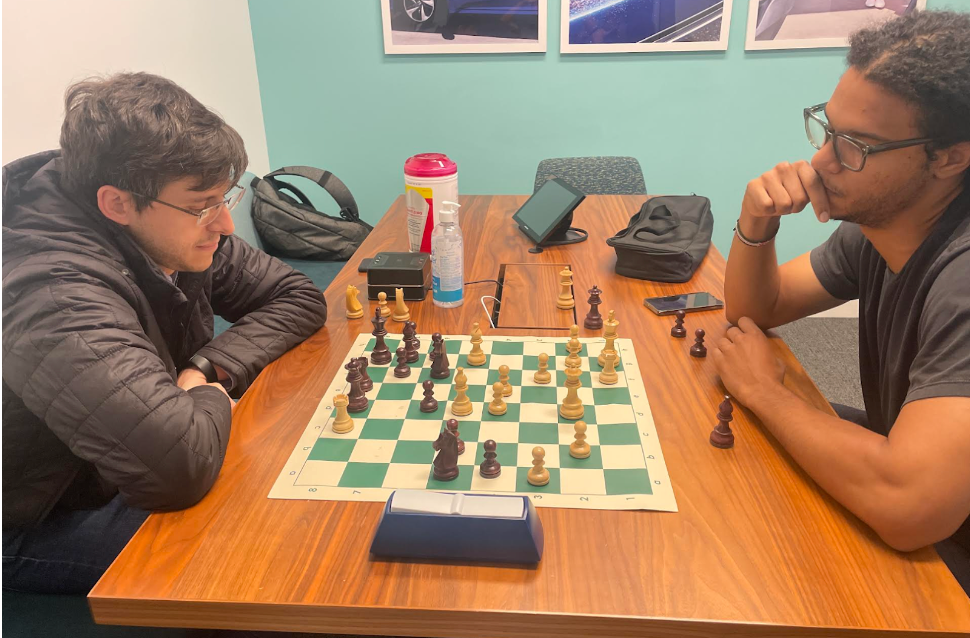 Picture: Two chess players in the middle of a chess game