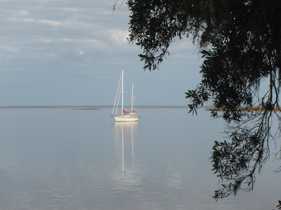 sailboat floating on a lake
