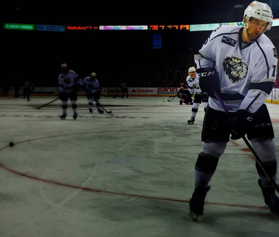 We used burst mode to get this shot. It was our favorite in the series of photos. This photo was captured during the Manchester Monarchs (ECHL hockey team for the LA Kings) warmup prior to a game last season.