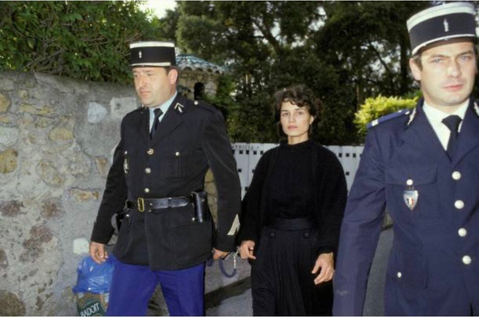 Rehana being arrested by the French police