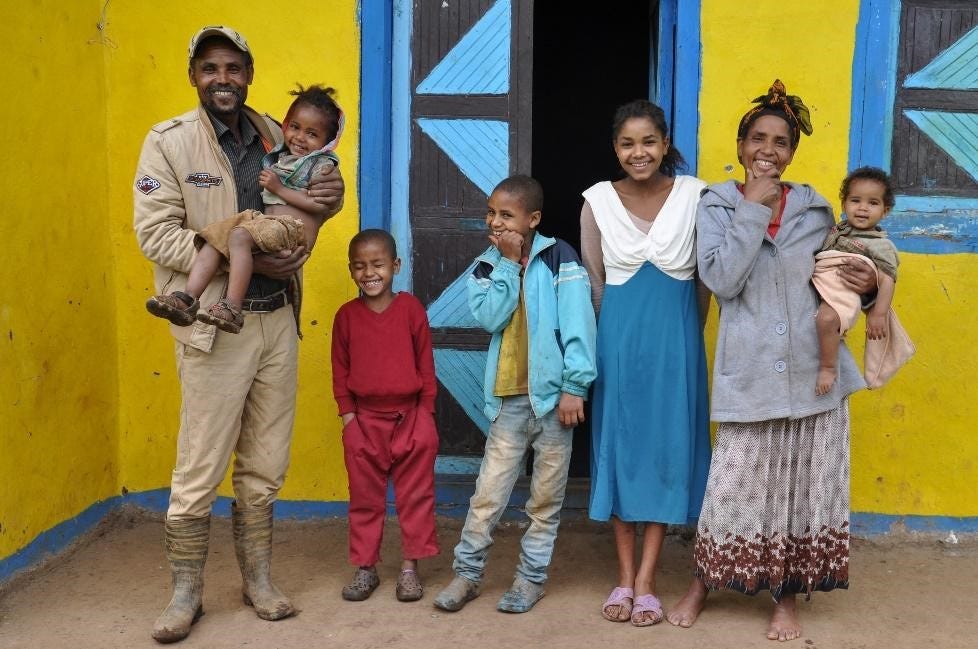 A Livelihoods for Resilience family ready to graduate after diversifying their livelihoods through goat fattening, potato farming, and beekeeping. (Photo: CARE)