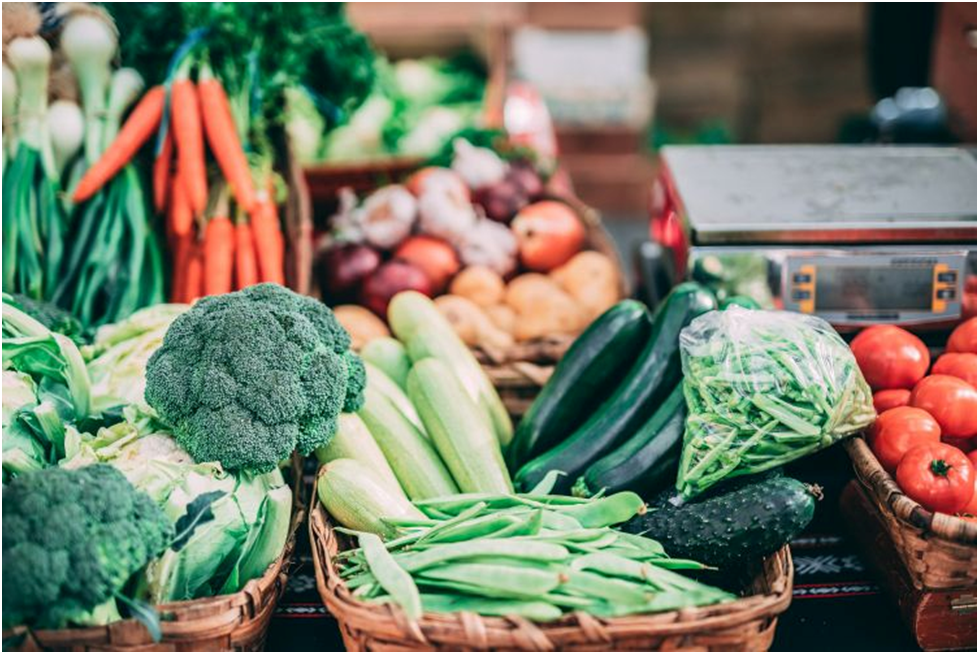 A bunch of fresh vegetables from carrots to cauliflowers