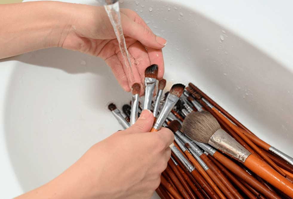 How often should makeup brushes be cleaned