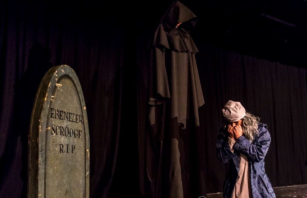 Photo of the author performing in A Christmas Carol.