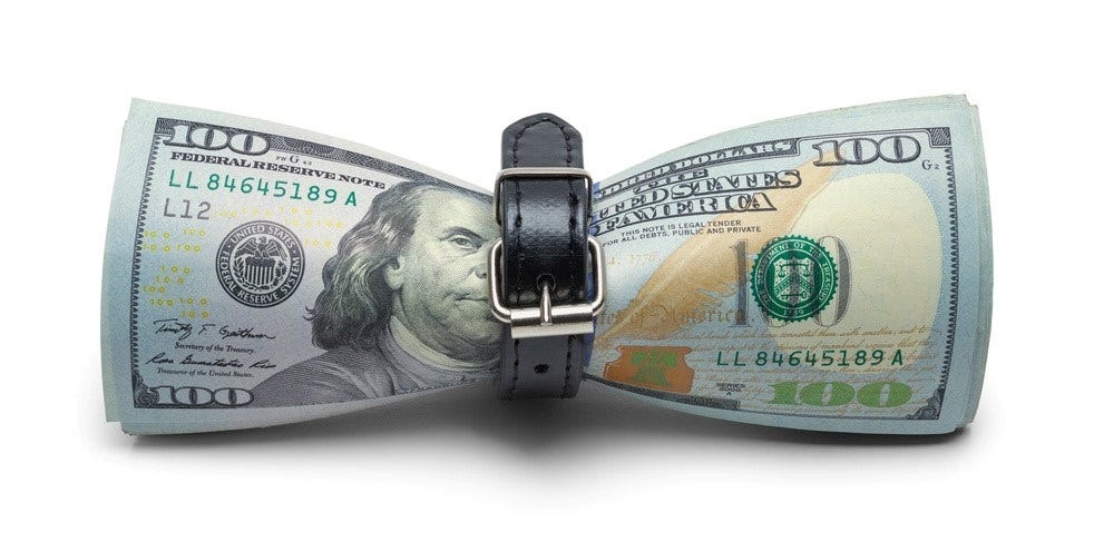 Image of a squeezed dollar note with a belt