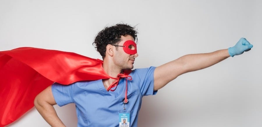 Source: Photo by Klaus Nielsen: https://www.pexels.com/photo/brave-doctor-in-flying-superhero-cape-with-fist-stretched-6303759/