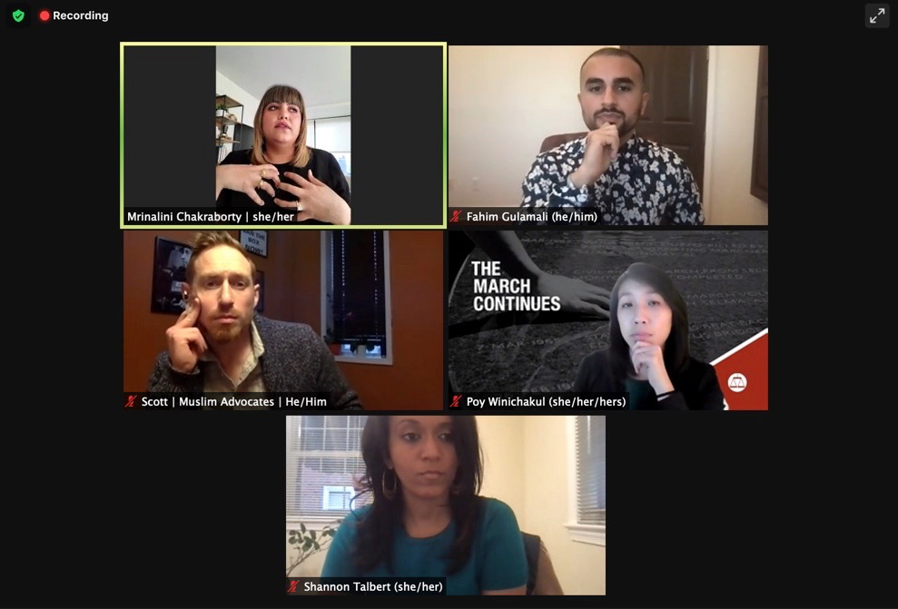 Screenshot of a zoom panel discussion with five windows of people. Black background.