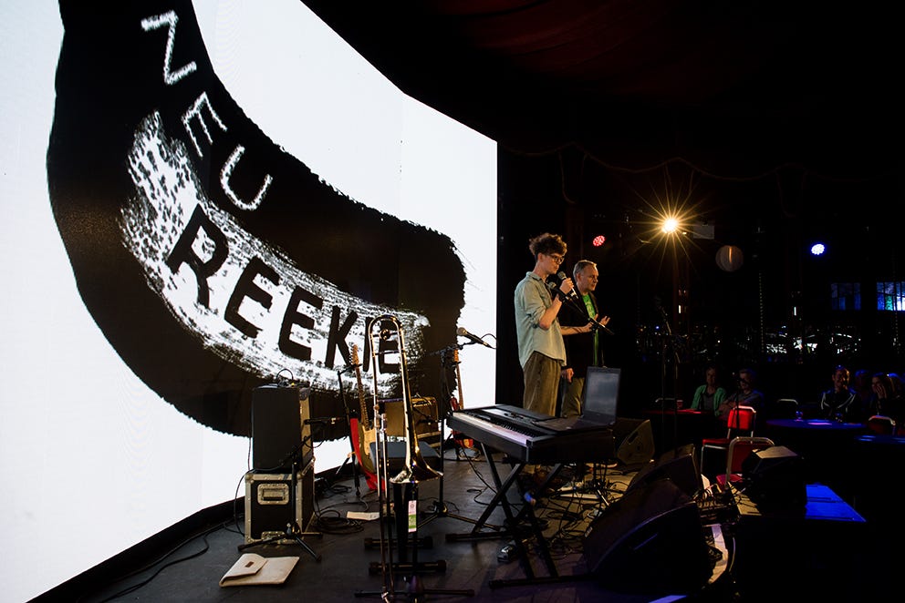 Neu! Reekie! stage with co-founders Michael Pedersen and Kevin Williamson performing