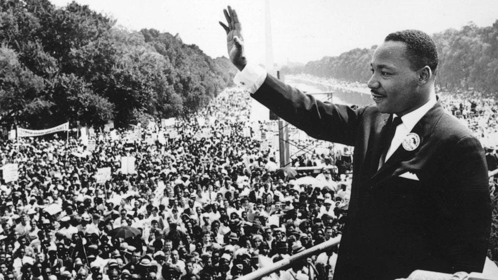 The civil rights leader Martin Luther King waves to supporters at the National Mall in Washington, Aug. 28, 1963.