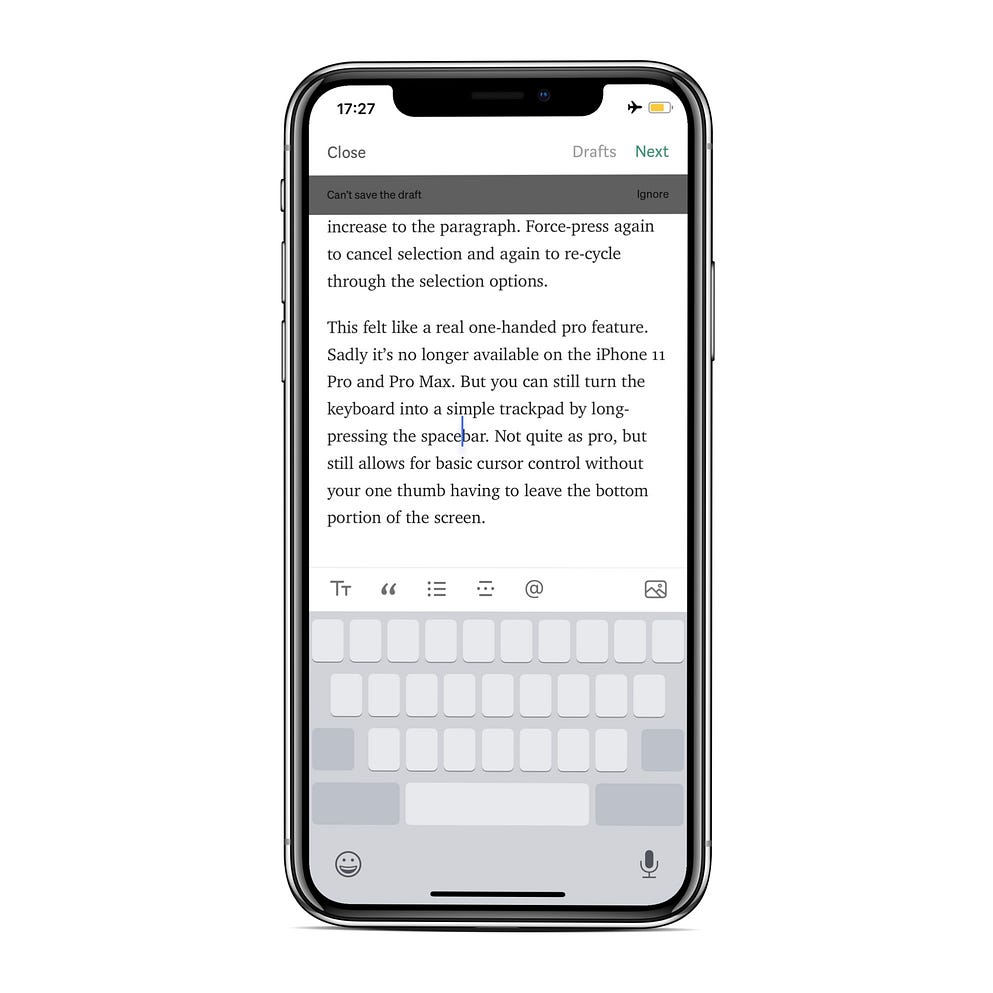 Screenshot of iPhone, showing keyboard as trackpad, following a long-press on the spacebar.