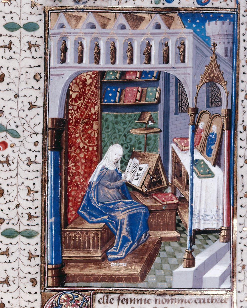 A woman in a nun’s habit and robe sits before a book surrounded in an opulent library with gilded books and tapestries/colorful designs on the walls