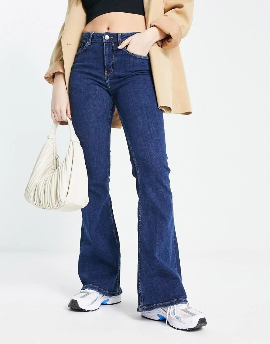 Comfortable Mango High-Waisted Flared Jeans in Mid Blue | Image