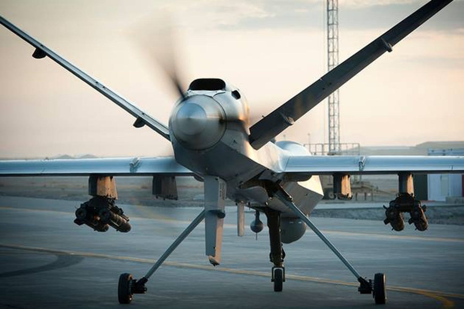 Above and at top - RAF Reapers. Crown Copyright