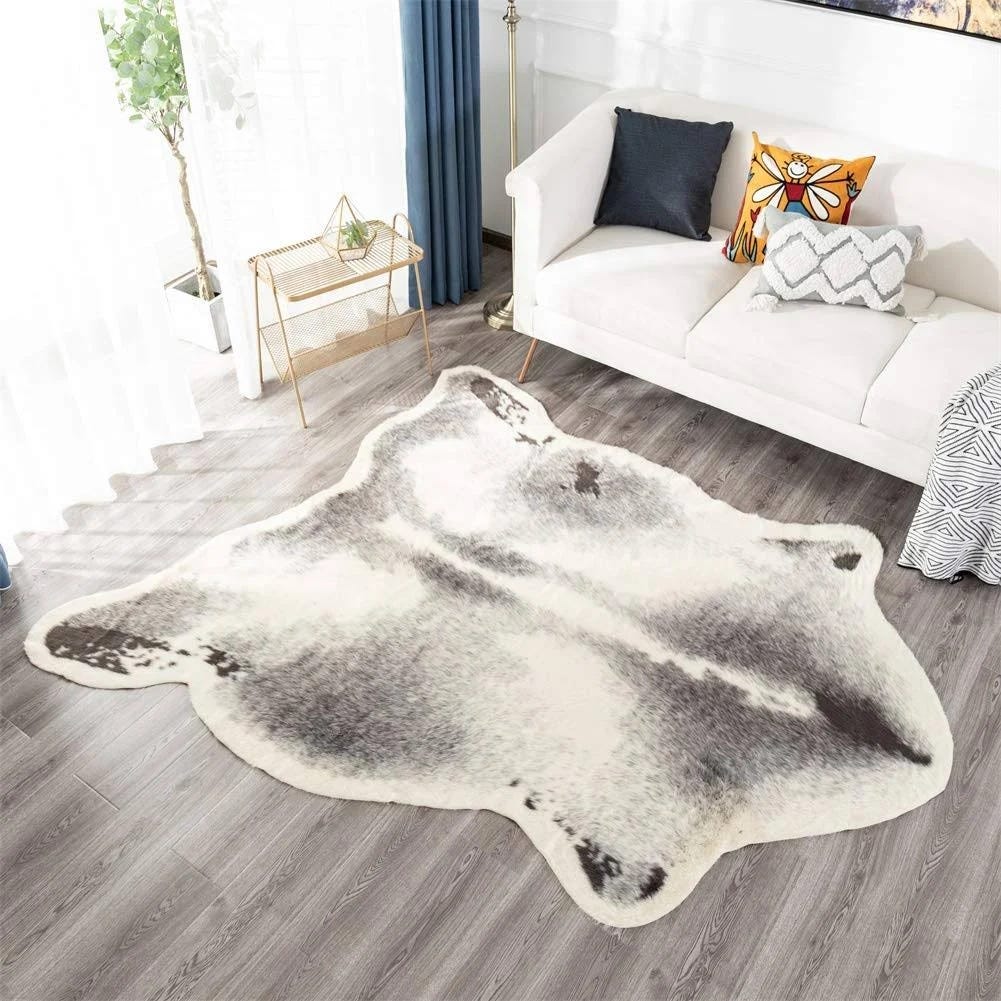 Faux Cowhide Rug: Stylish Animal Hide Design for the Living Room | Image