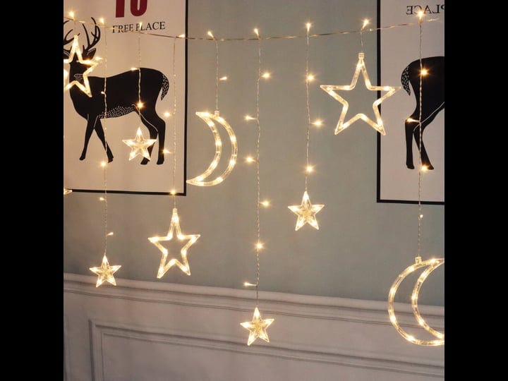 mainstays-144-count-indoor-battery-operated-warm-white-led-curtain-lights-with-stars-and-moons-1